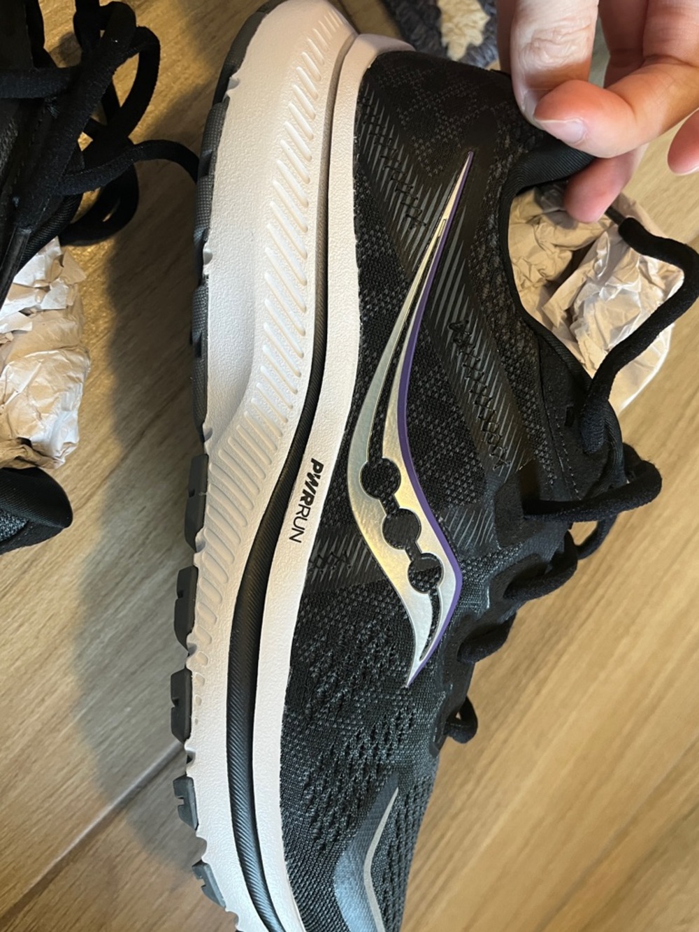 NWOB Saucony Omni 20. Black. It’s marked size 11 but fits like 9.5-10. 
.